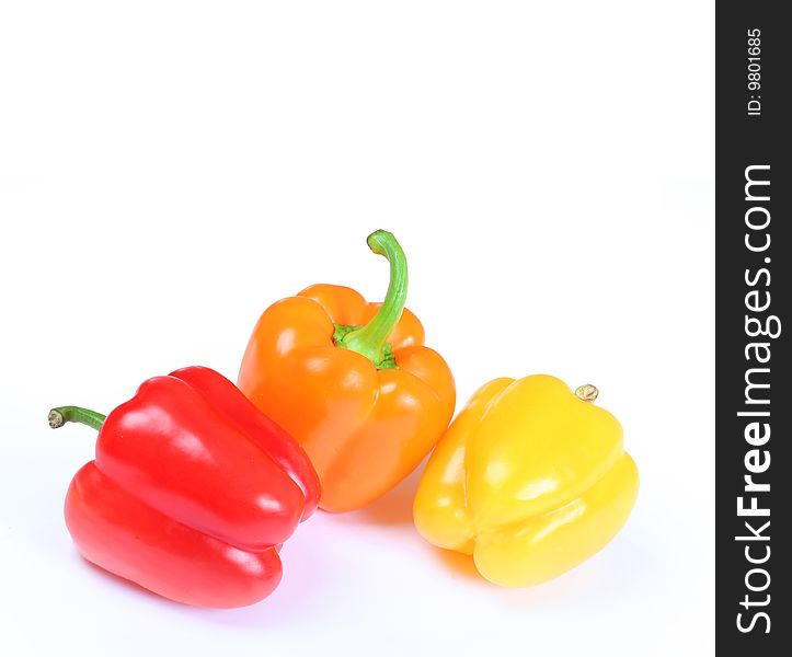 Bright colorful peppers isolated on white. Bright colorful peppers isolated on white