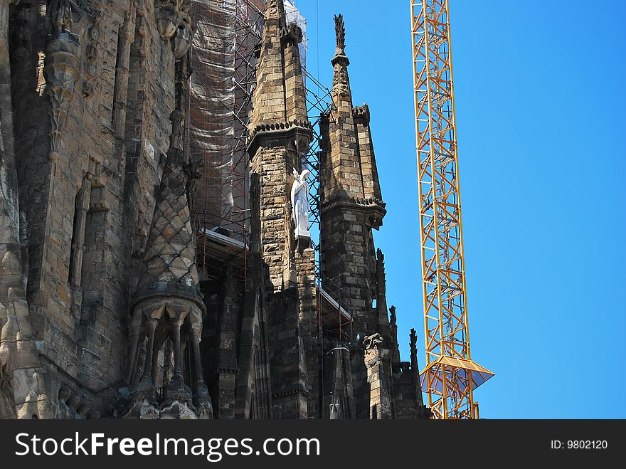 Construction Of Sagrada Familia on a blue sky