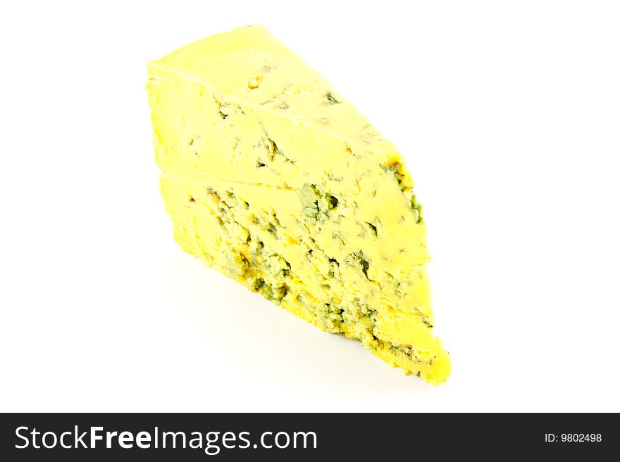 Slice of blue cheese with clipping path on a white background