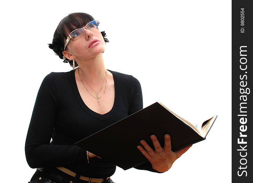 Brunette woman with a book in her hands on a white background. Brunette woman with a book in her hands on a white background