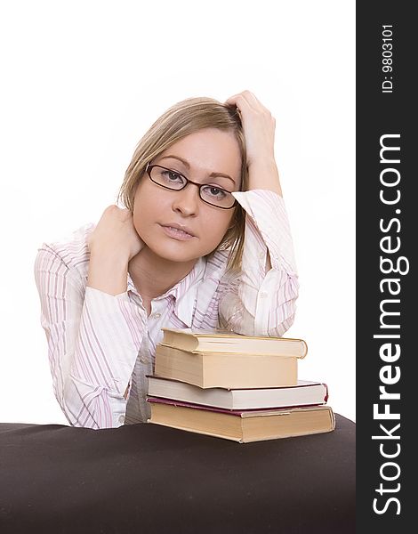 Woman leaning with their elbows on a books. Woman leaning with their elbows on a books