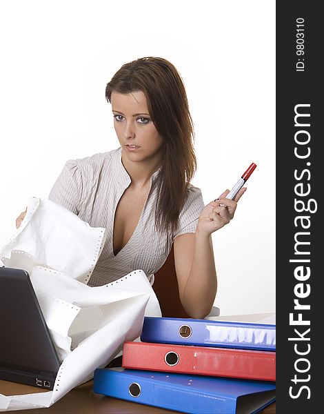 Young frustrated business woman reading reports. Young frustrated business woman reading reports