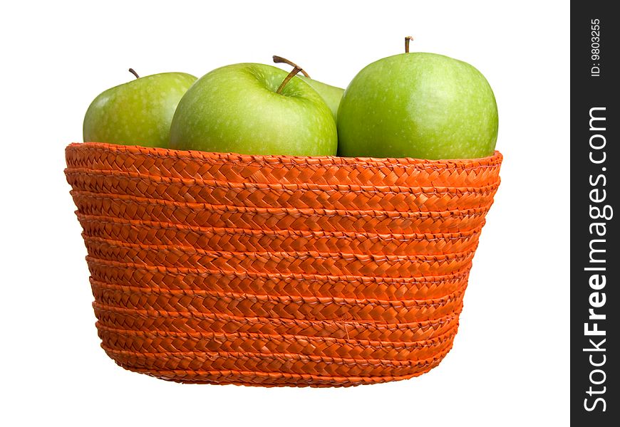 Green apples in a basket on white background