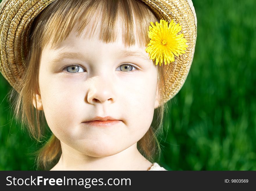 Little girl in green grass