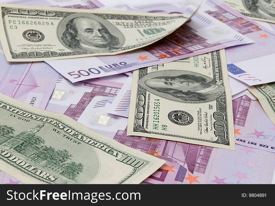 Background of one hundred dollars and euro. Background of one hundred dollars and euro