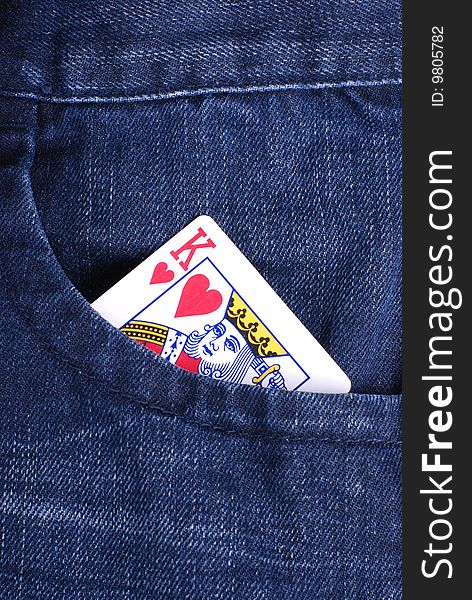 Poker:king of hearts in front pocket of jean