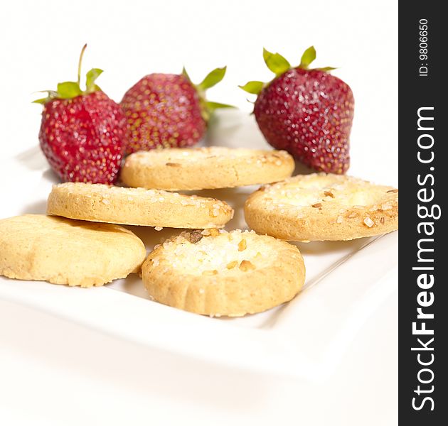 Cookie on the plate with strawberry