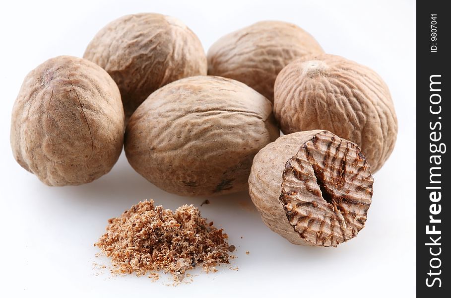 Nutmeg on a white background. Nutmeg on a white background