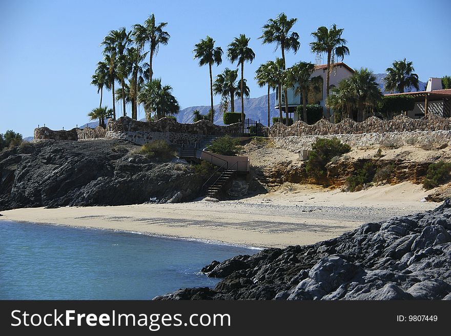 A beautiful cove created by lava flows on either side awaits visitors a short walk north of San Felipe, Baja California, Mexico. A beautiful cove created by lava flows on either side awaits visitors a short walk north of San Felipe, Baja California, Mexico.