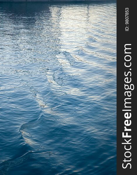 Vertical shot of ripples on sea water