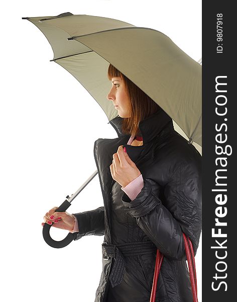 Young woman in coat under umbrella isolated on white