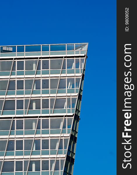 Apartment building in Liverpool with blue sky as background