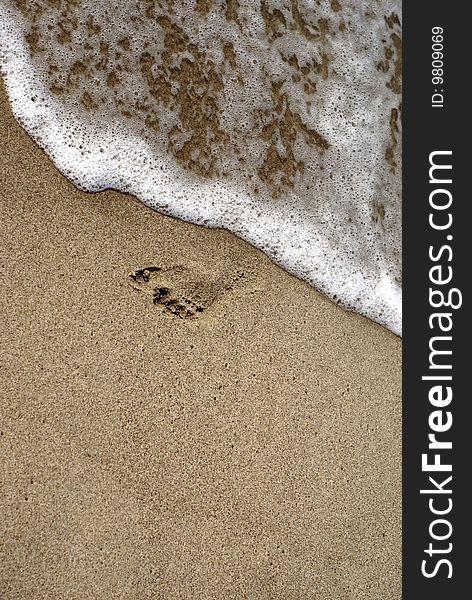 Foot print sea sand