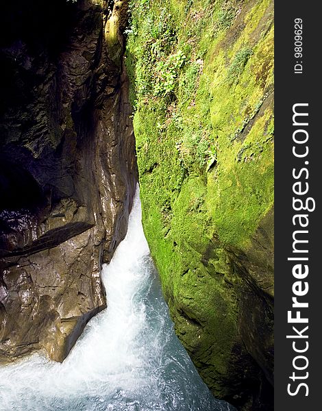 Scroll of a stream between the rocks. Scroll of a stream between the rocks