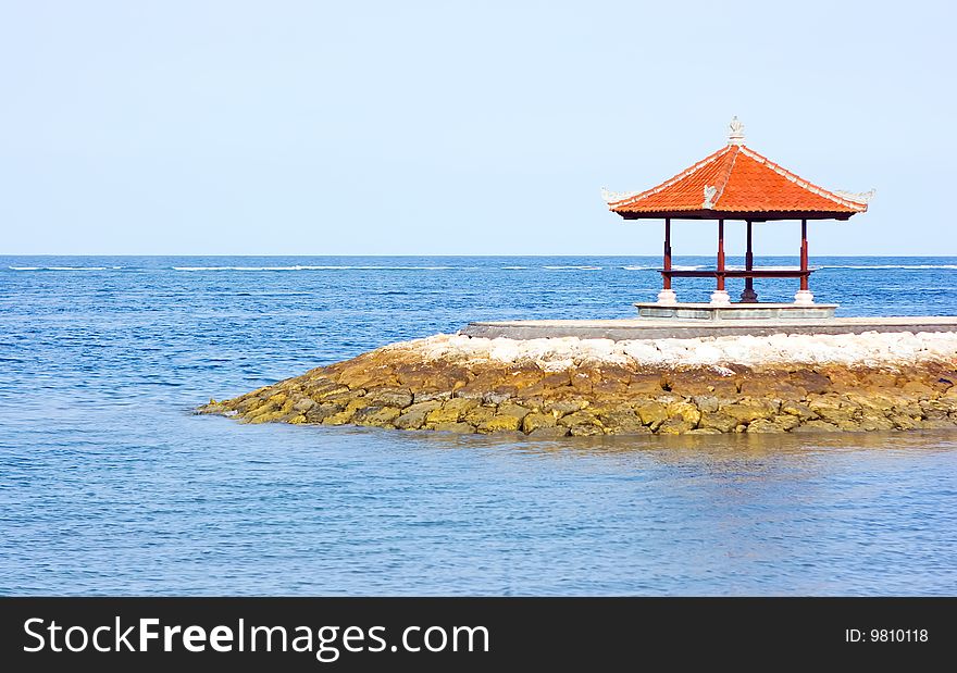 Small pagoda standing at the sea shore