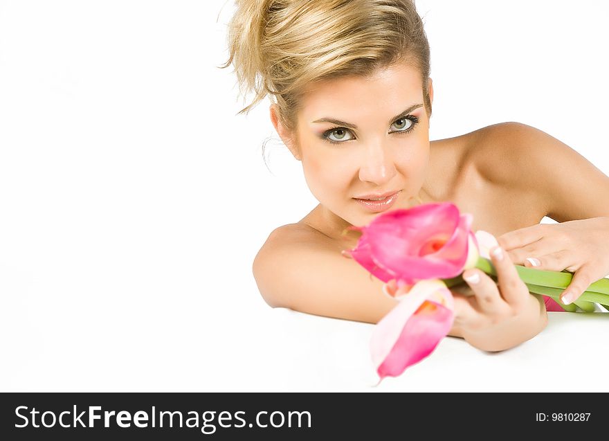 Blonde girl with flowers in hands isolated on white
