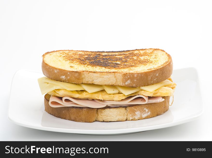 Tasty sandwich of ham and cheese omelet