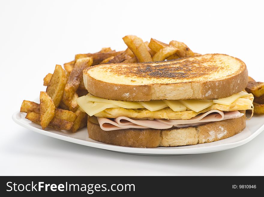 Tasty sandwich of ham and cheese omelet isolated