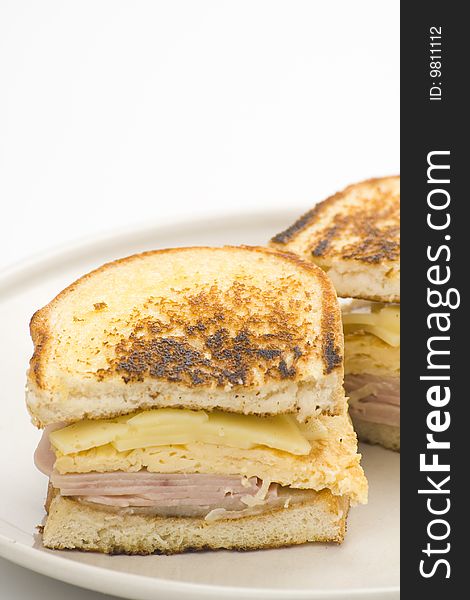 Tasty sandwich of ham and cheese omelet isolated