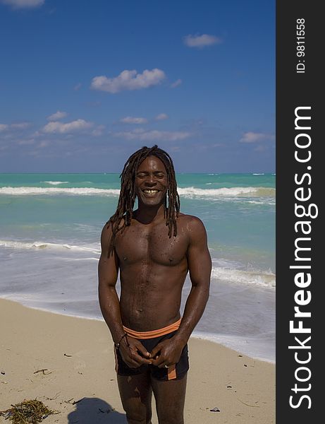 Smiling Man On The Beach In Cuba