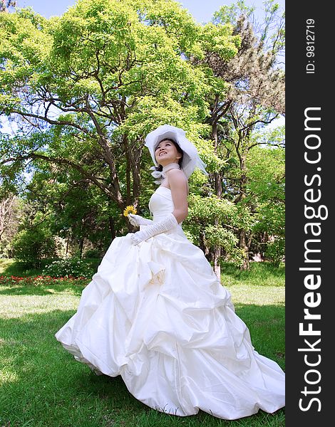 Beautiful bride with white wedding gown