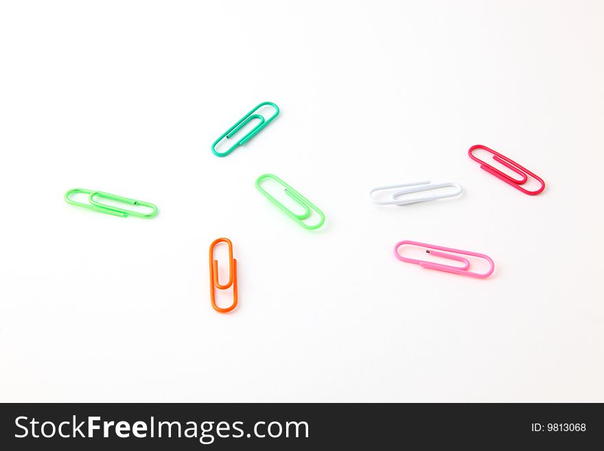 Color paper clips, green, red, white