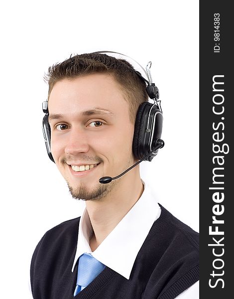 Portrait of a smiling young guy with headphones on his head, isolated over white background