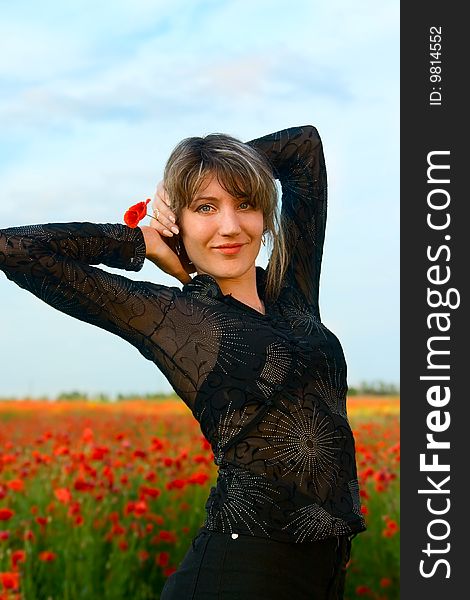 Portrait woman with poppy on nature. Portrait woman with poppy on nature