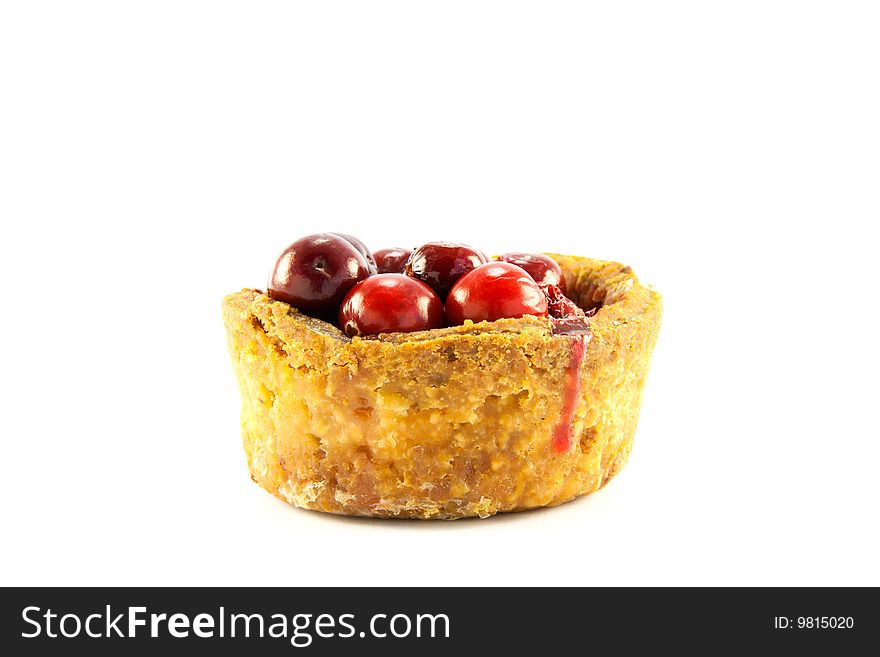 Single pork pie with cranberries on the top with clipping path on a white background