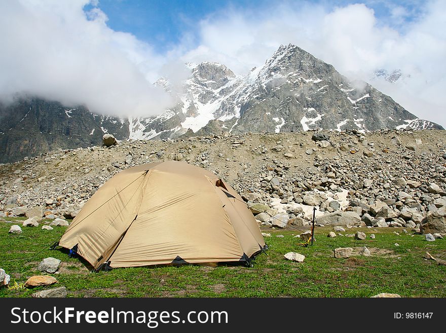 Yelow tent in Caucasus mountain