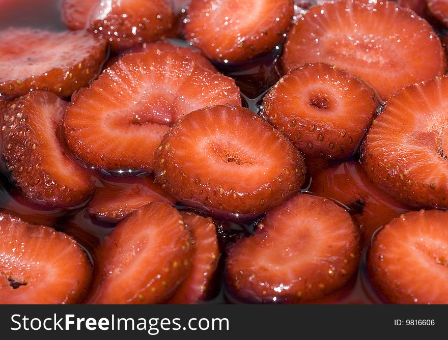 Close up of strawberries in red wine