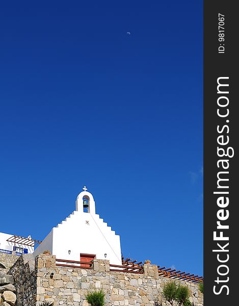 A white church and blue sky in Greece