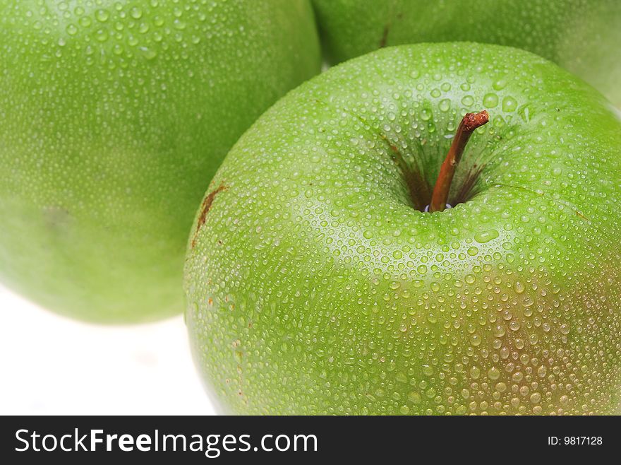 Close-up of green delicious apples with drops. Close-up of green delicious apples with drops