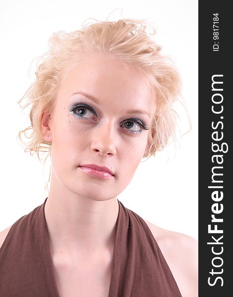 Beautiful blond fashion model posing in studio. Beautiful blond fashion model posing in studio