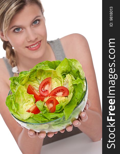 Healthy lifestyle series - Woman with salad on white background, focus on salad