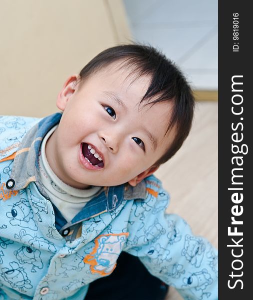 Portrait of naive boy laughing. Portrait of naive boy laughing