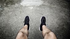 Legs Of A Man Resting In The City Stock Photography