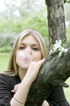 Playful Blond Girl With Bubble Gum Stock Image Playful Blond Girl With Bubble Gum Stock Image