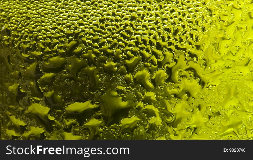 Water-drops on a green glass. Water-drops on a green glass