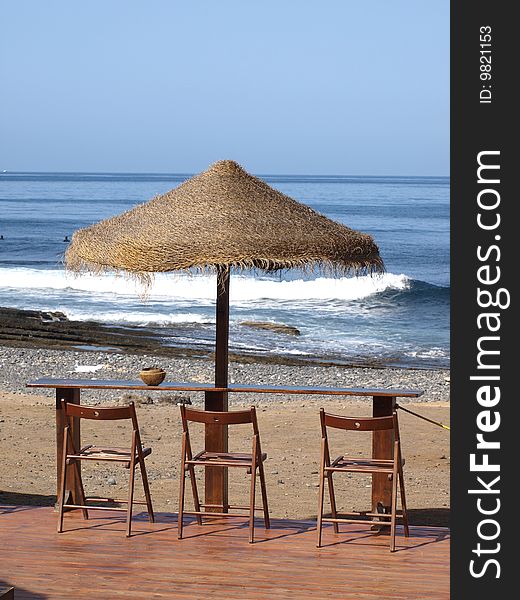 A cool spot overlooking the sea under blue skies. A cool spot overlooking the sea under blue skies