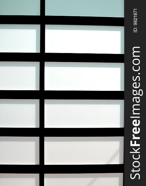 Modern glass door with a grid