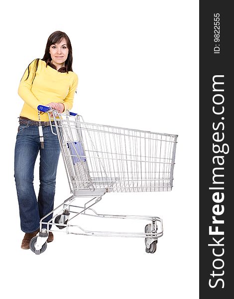 Attractive brunette woman with shopping cart
