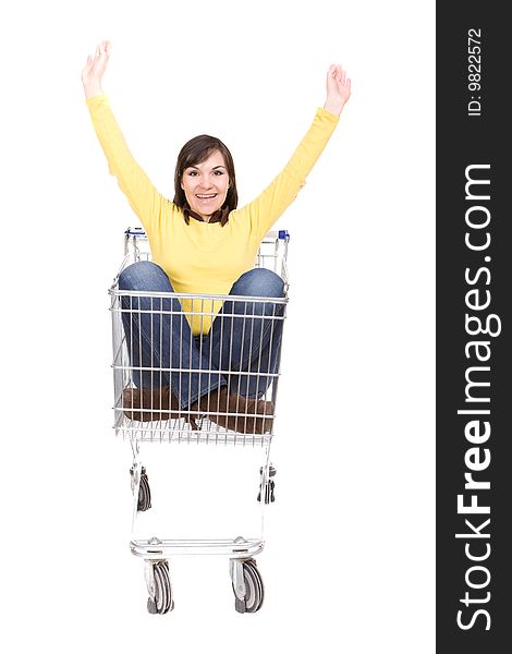 Attractive brunette woman with shopping cart