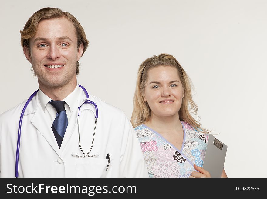 Portrait of two medical professionals smiling. Portrait of two medical professionals smiling