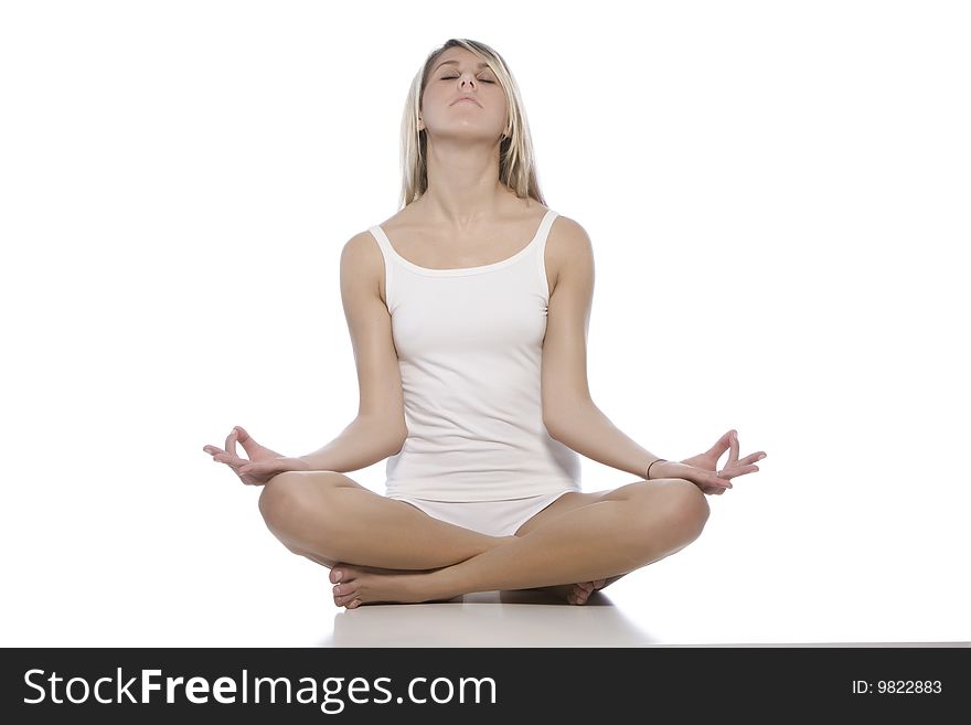 Young woman making yoga- exercises