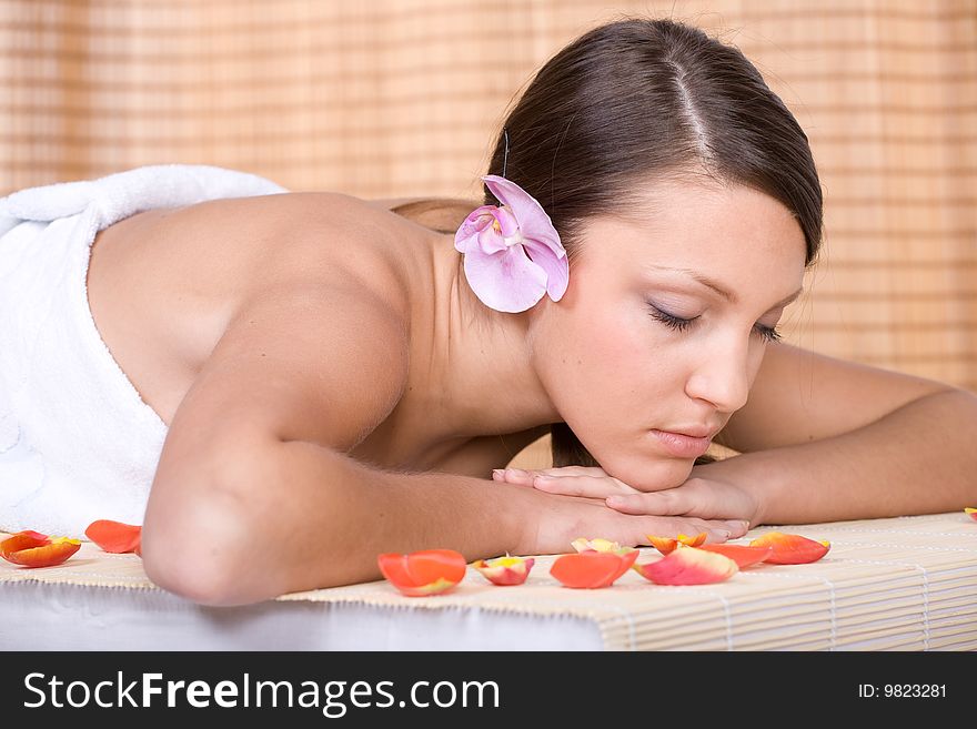 Young woman relaxing in spa salon. Young woman relaxing in spa salon