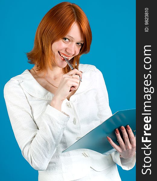 Pretty secretary held folder, isolated on blue background