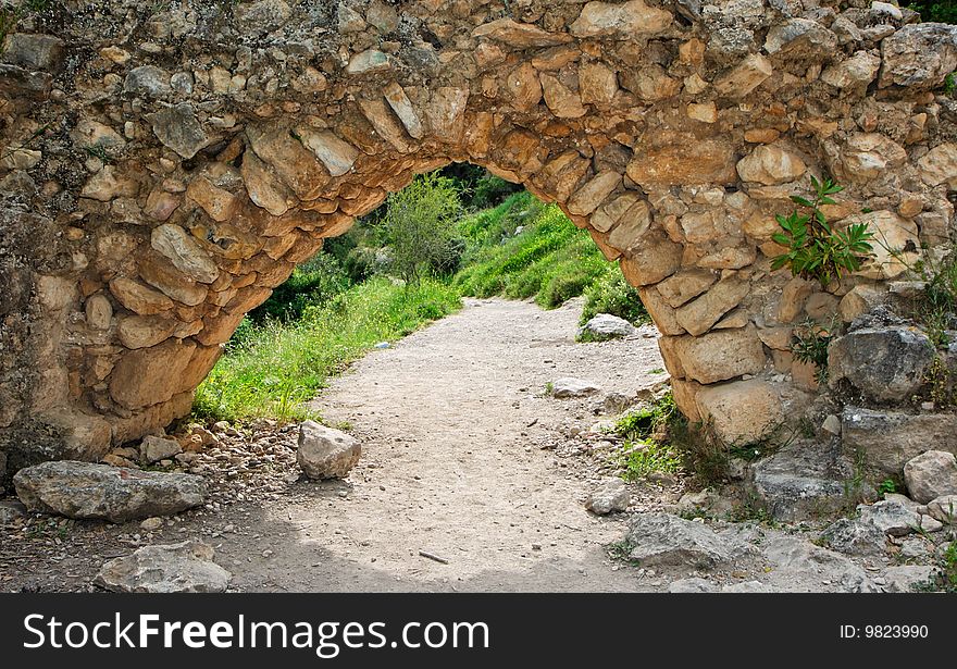 Ancient stone arch on the hiking trail outdoor. Ancient stone arch on the hiking trail outdoor