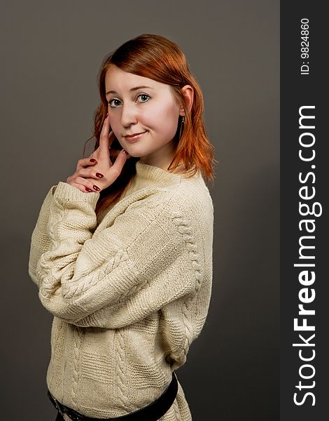 Red Haired Girl In Sweater Turned