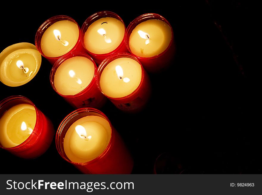 Religios candles on a black background